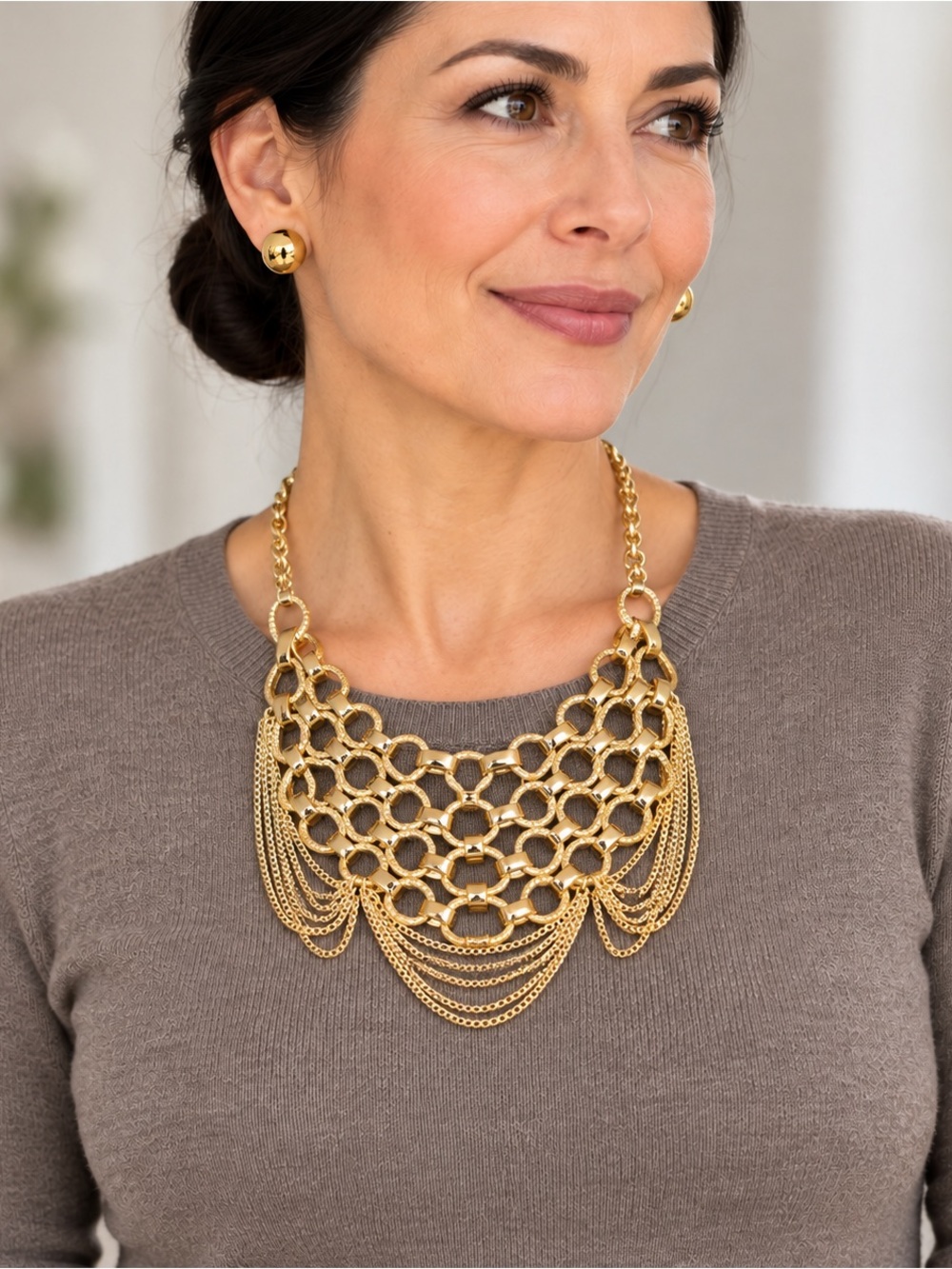 Gold Multi-Row Chain-Link Statement Necklace and Gold Studs earrings Set.